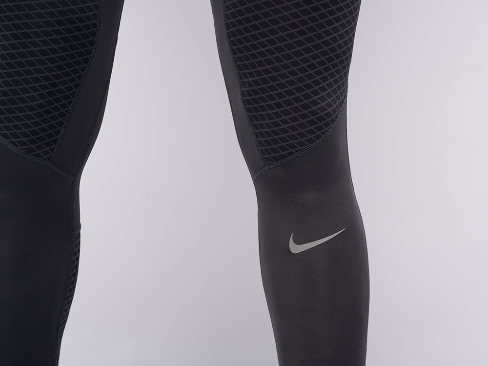 Тайтсы Nike